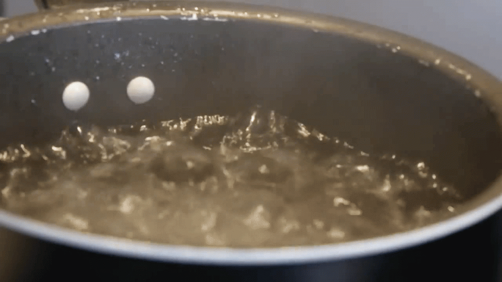 Boiling turmeric in water releases curcumin