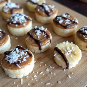 banana disks with almond butter and shredded coconut